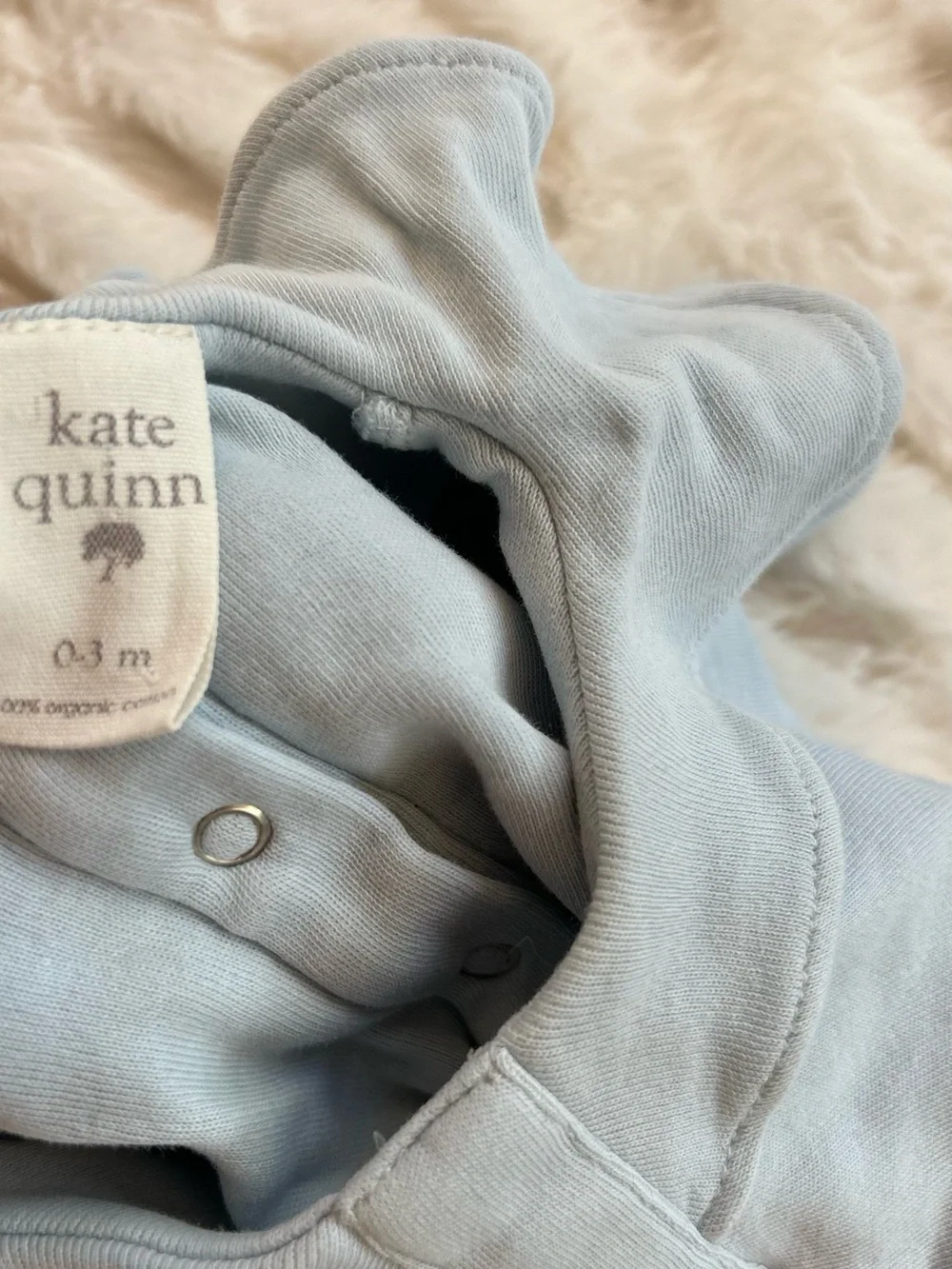 Kate Quinn Cotton Ruffle Neck Footie